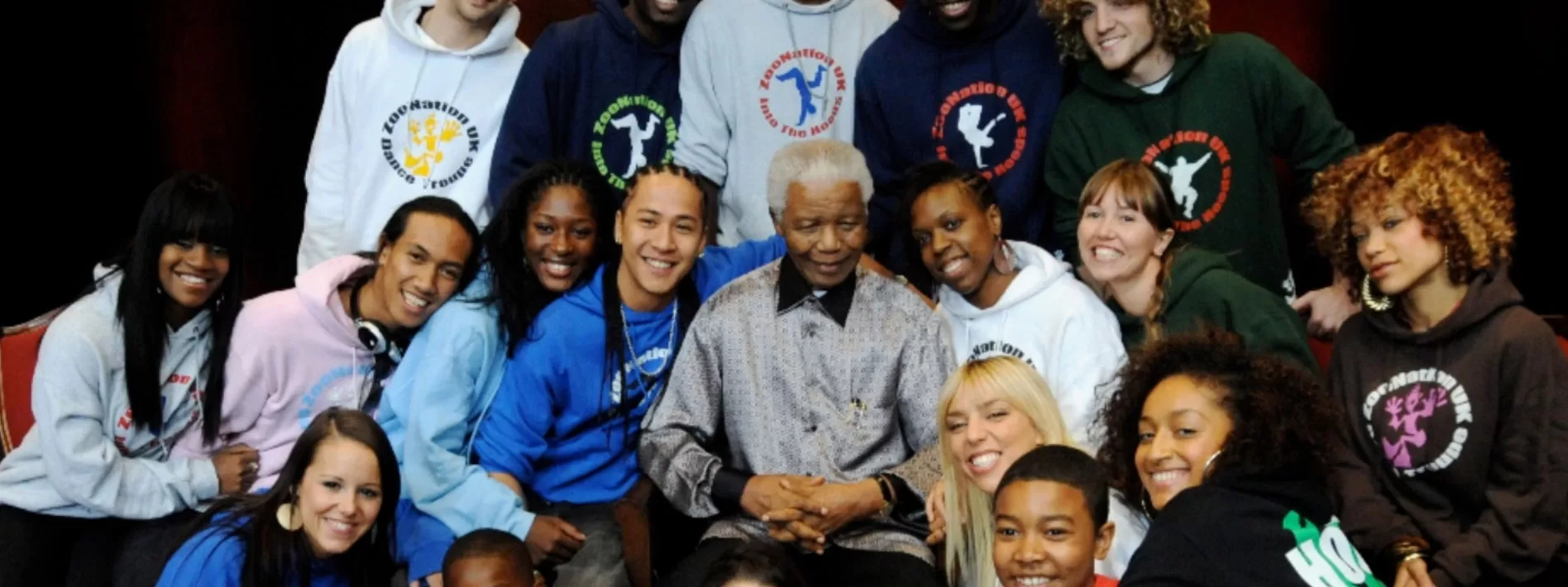 ZooNation dancers surround Nelson Mandela
